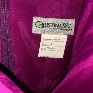 Two Christina Wu long dresses.